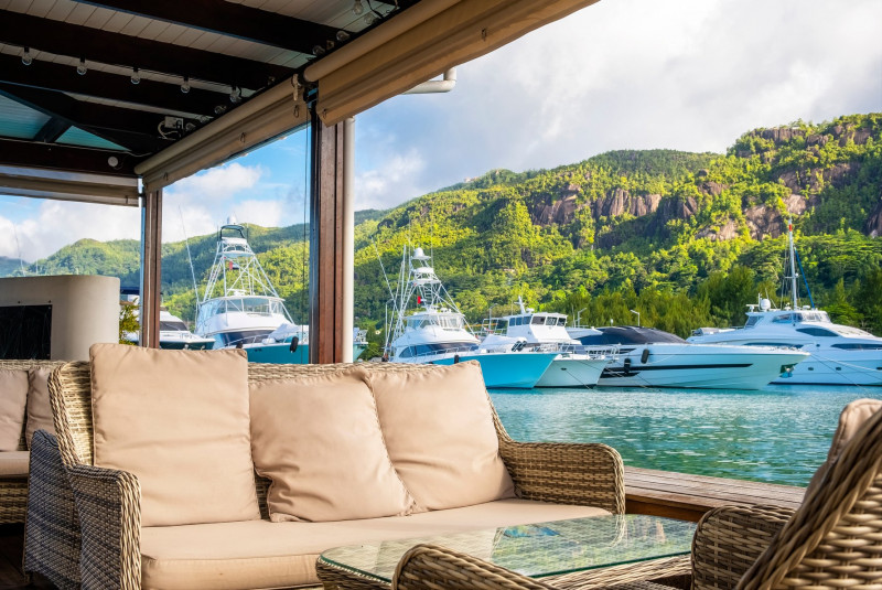 The Boardwalk lounge with yacht views on Eden Island Seychelles